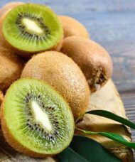 Kiwifruit plant fruit with green flesh and fuzzy brown skin.