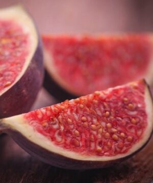 Quartered Brown turkey fig showing seedy red flesh