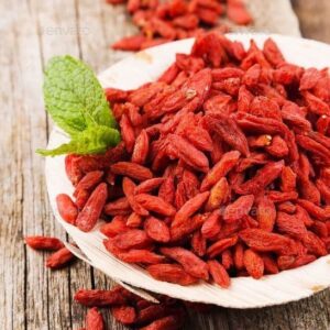 Princess Tao goji berry plant dried fruits in a bowl.