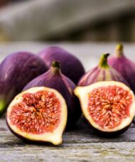Black Mission Figs with purplish black skin and pink interior.