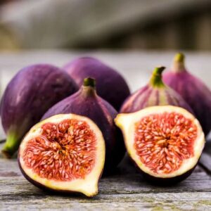 Black Mission Figs with purplish black skin and pink interior.