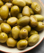 Picholine Olive plant fruits in a bowl.