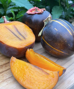 Kaki Persimmon with a dark skin and a yellowy orange flesh with dark stripes.