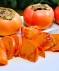Sliced Prairie Gem Persimmon on a platter.